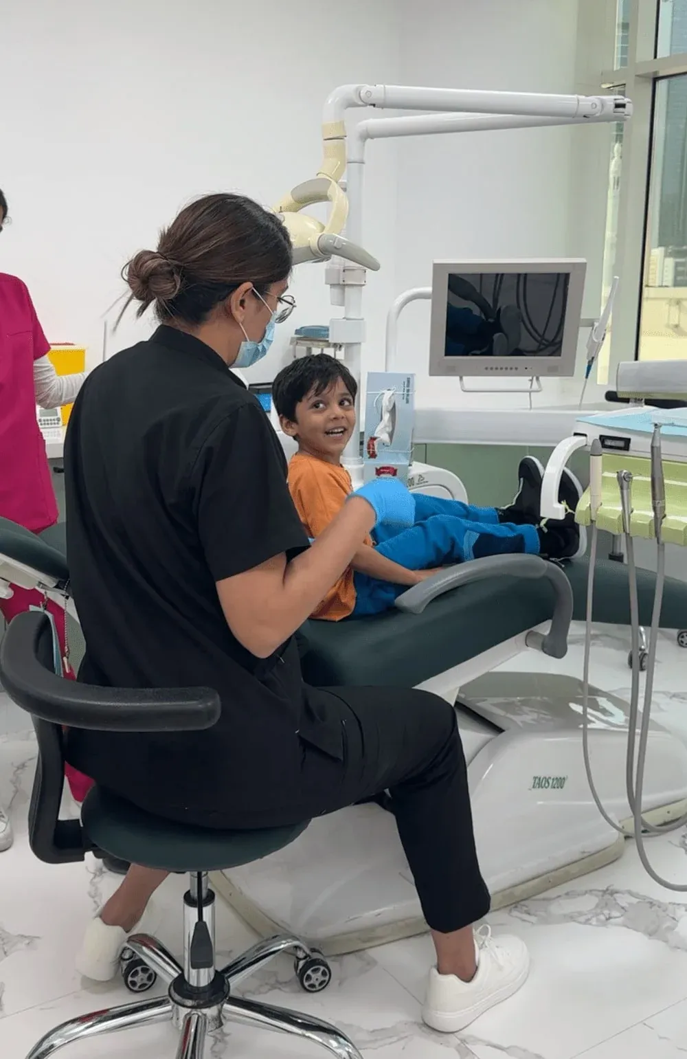 A child receiving dental care at Legacy Care