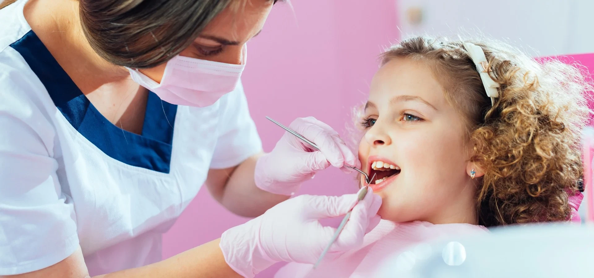 A child receiving a preventive dental examination