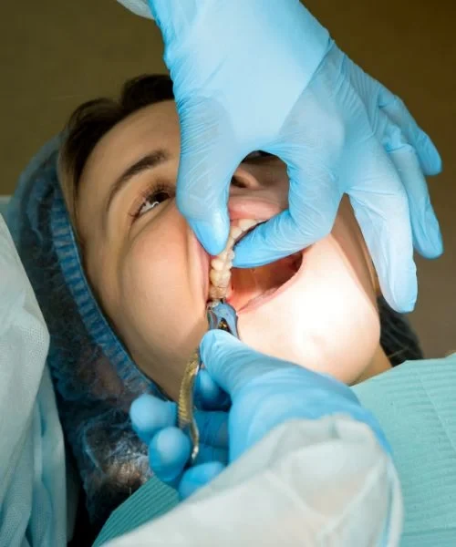 A patient being examined before dental treatment